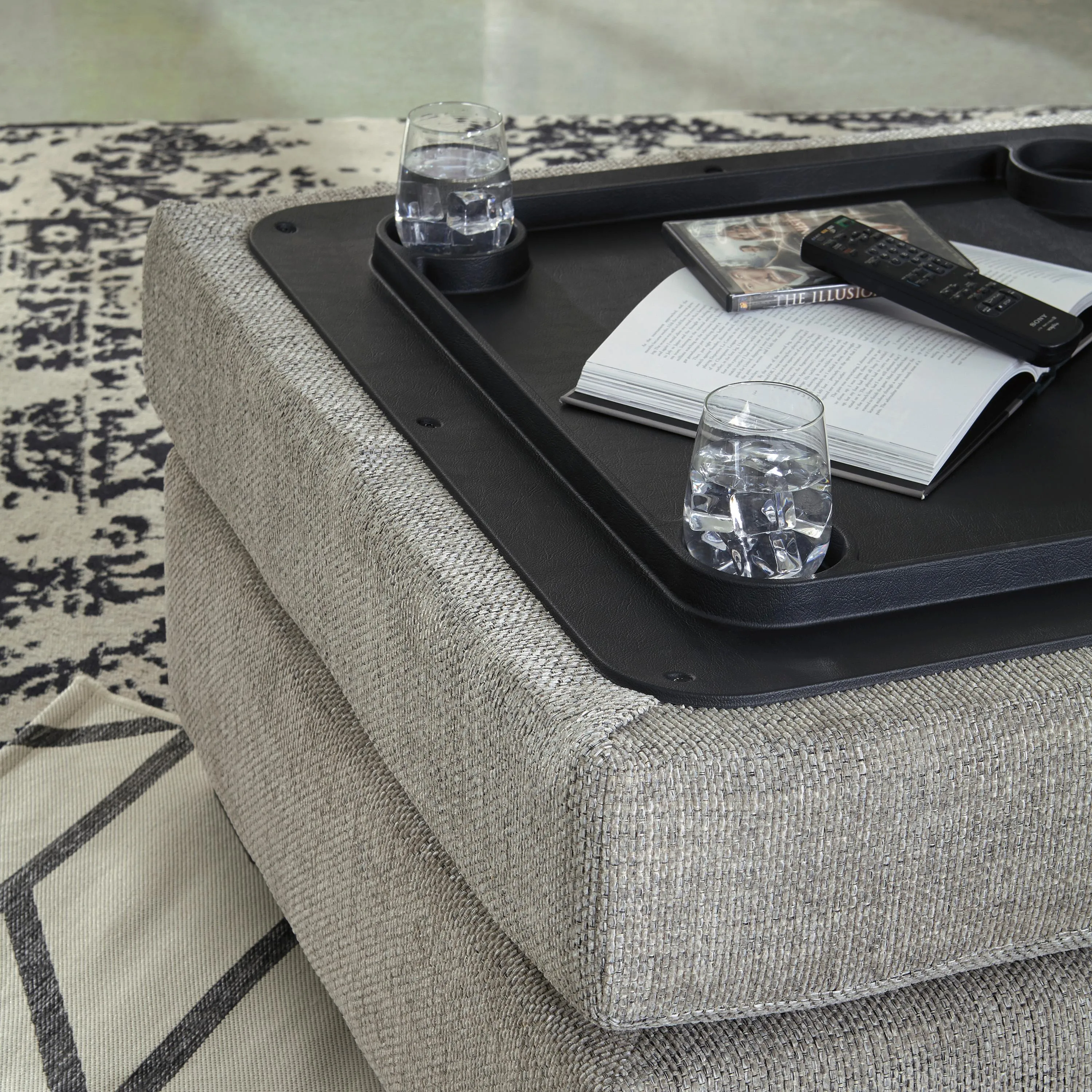 Benchcraft Megginson Fabric Storage Ottoman 9600611