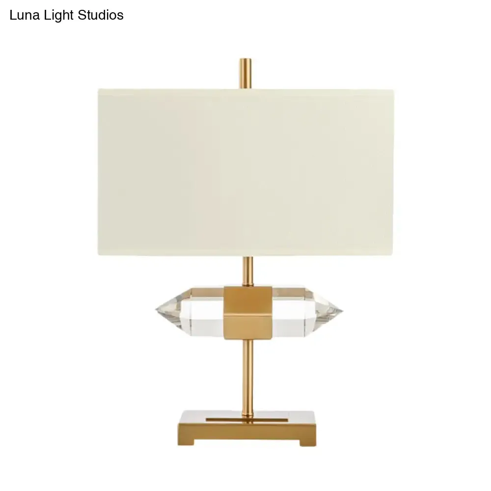 Golden Simplicity: 1-Light Table Lamp with Rectangle Fabric Shade and Crystal Prism Decor