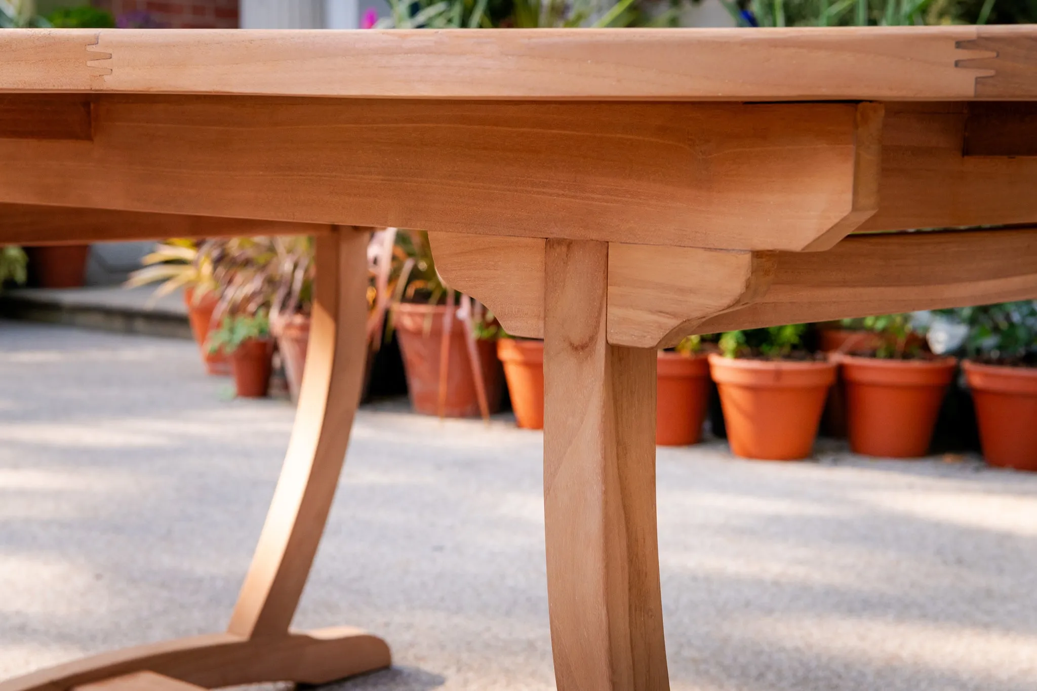 The Sherringham Sunburst Teak Oval Table