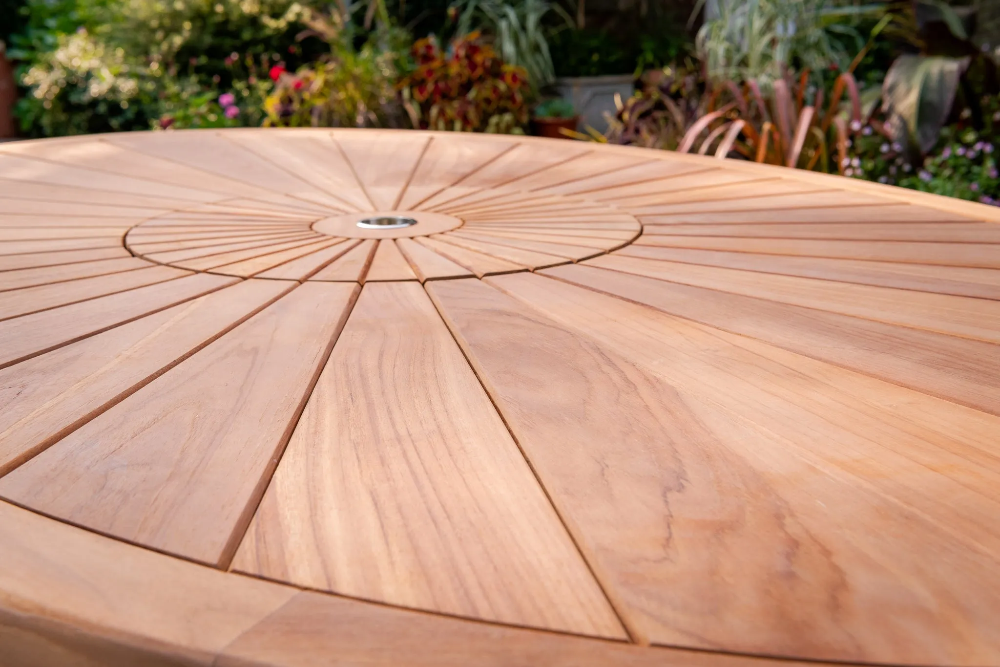 The Sherringham Sunburst Teak Oval Table