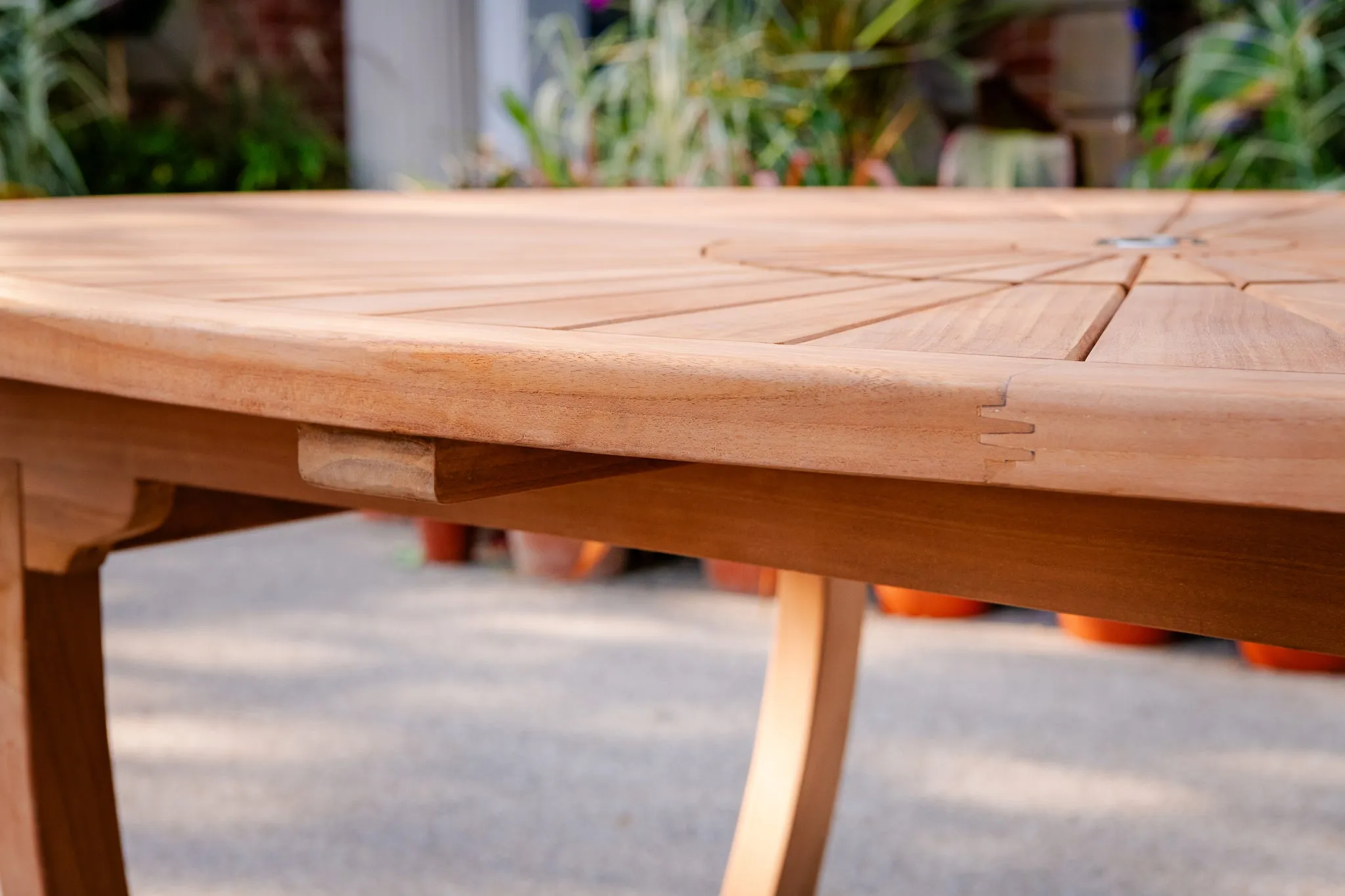 The Sherringham Sunburst Teak Oval Table