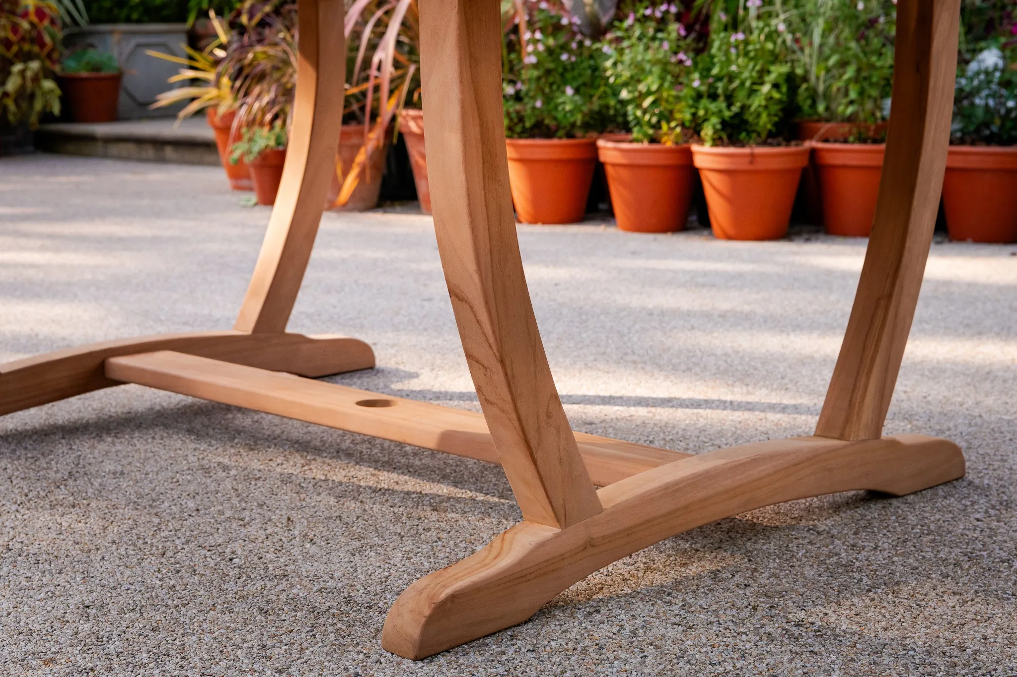 The Sherringham Sunburst Teak Oval Table