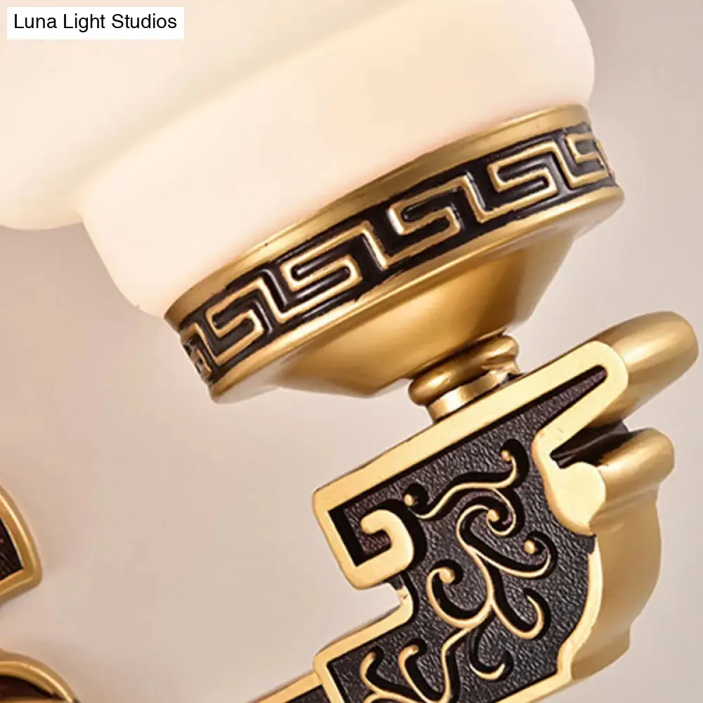 Vintage Brass Wall Sconce with Stylish Frosted Glass Drum Shade